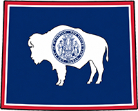Wyoming state outline with flag in-fill
